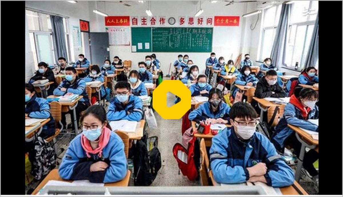 ببینید | تصاویری از انتقال گروهی دانش‌آموزان دبیرستان چینی به محل قرنطینه!