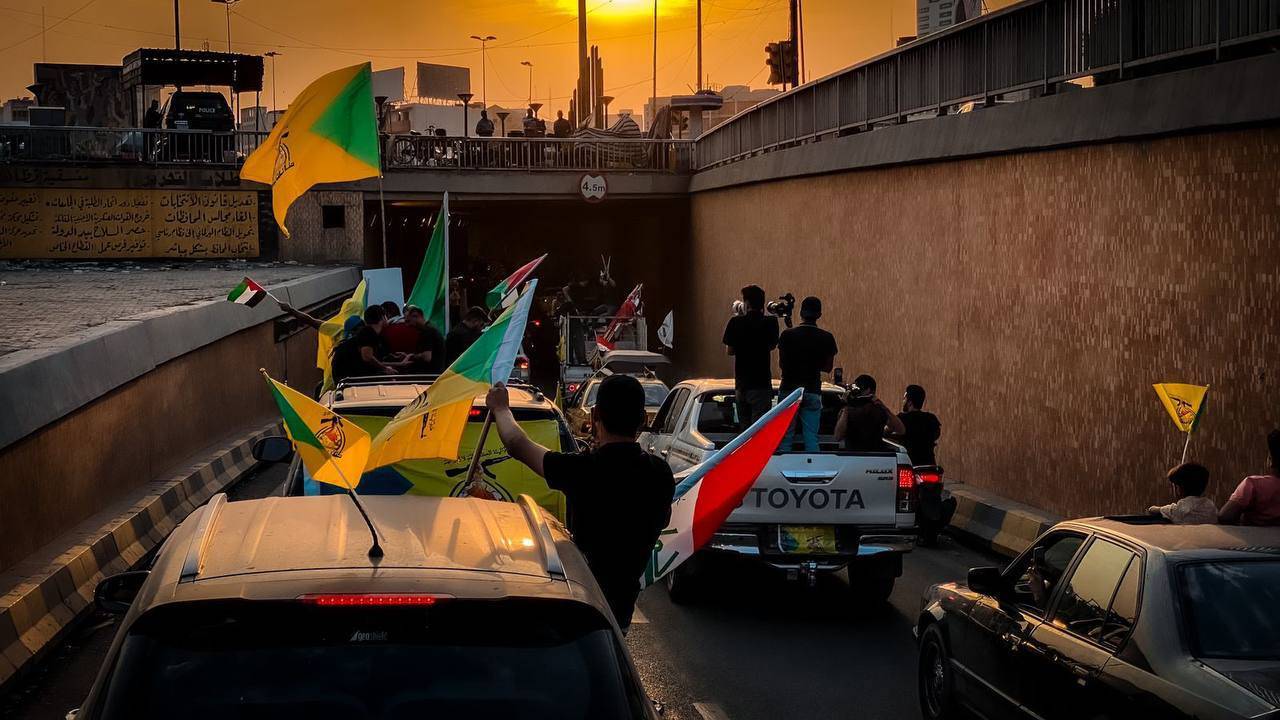 عکس | آتش زدن تصویر بن‌سلمان در میدان تحریر بغداد