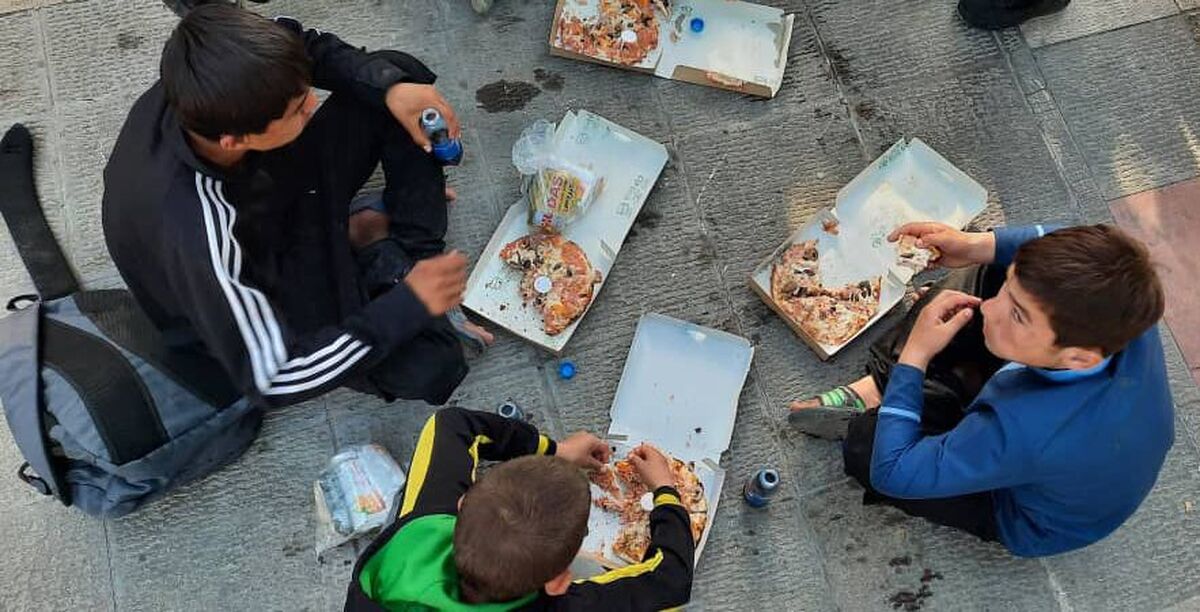 ماجرای توزیع پیتزا بین کودکان کار چه بود؟